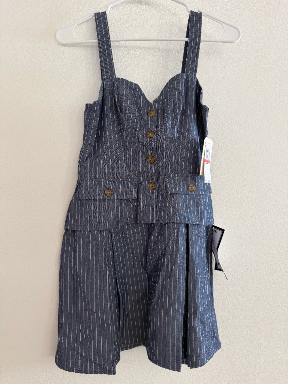 City Studio mini dress - a pinstripe pattern, button-front bodice, and pleated s